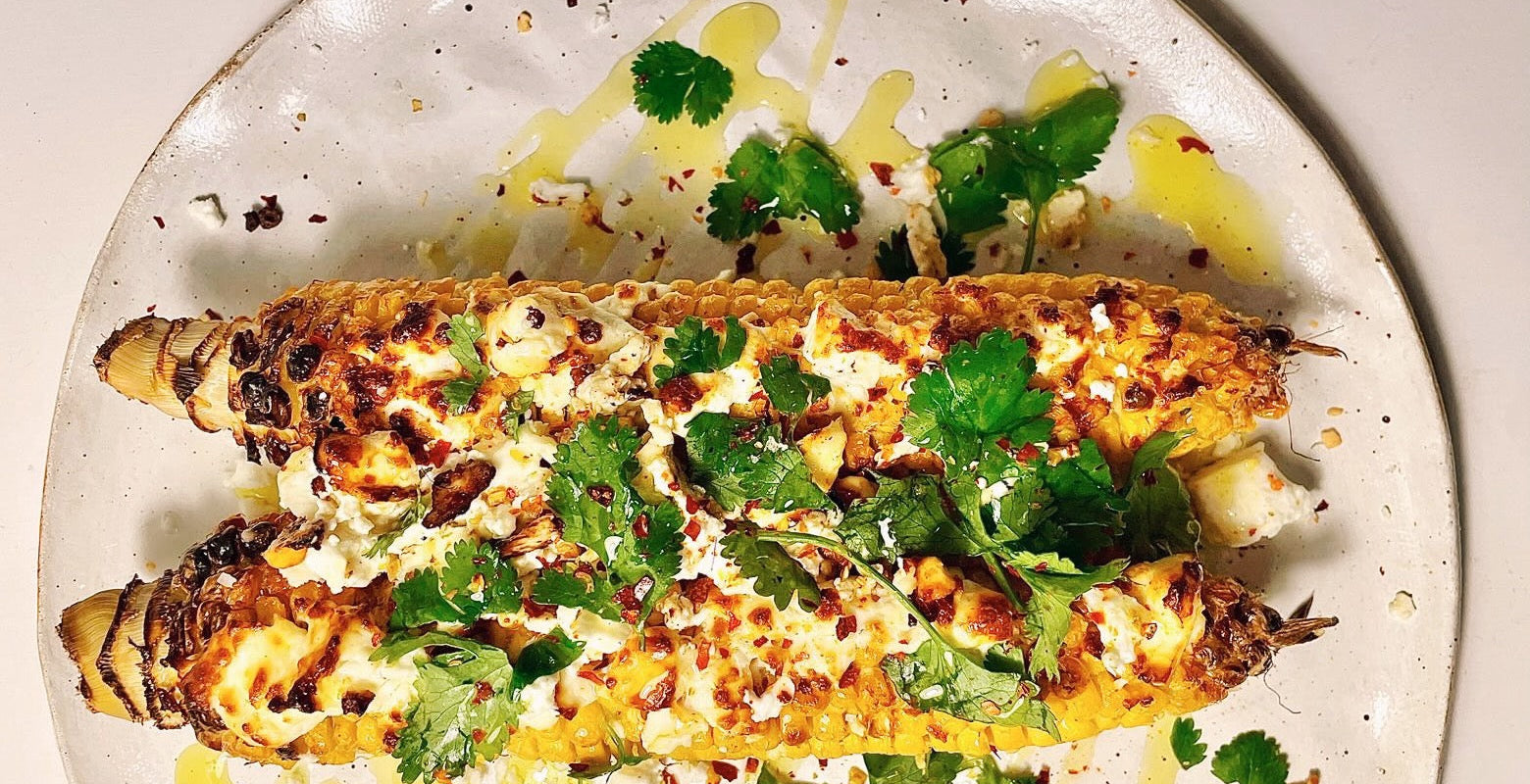 corn with extra virgin olive oil and fresh herbs