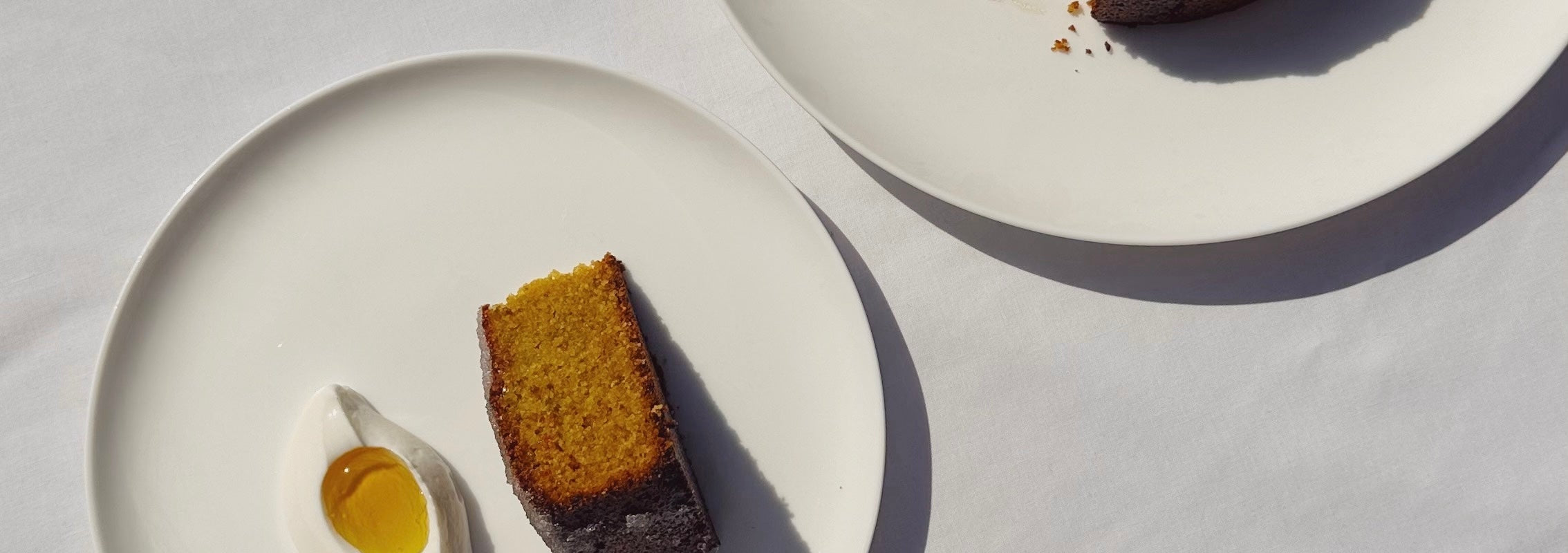 Image for Pistachio and Olive Oil Cake with Elderflower: The days are getting longer, the sun is shining, and elderflowe