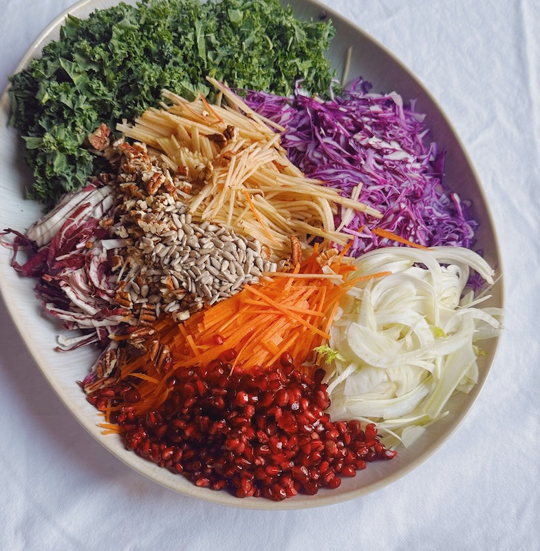 Image for Rainbow kale salad: Crunchy kale, sweet pomegranate, and succulent seeds bring vibrancy back to winter days